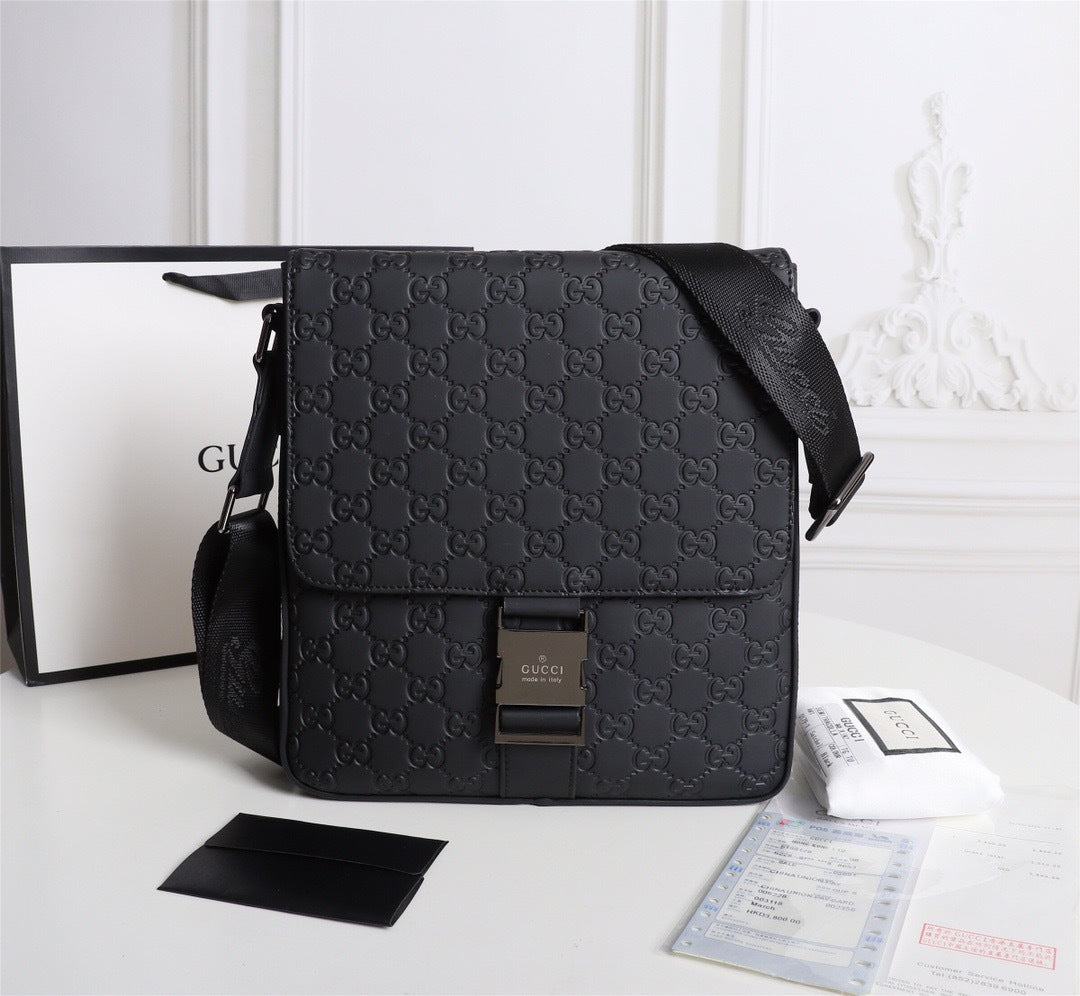 Gucci GG Embossed Messenger Bag