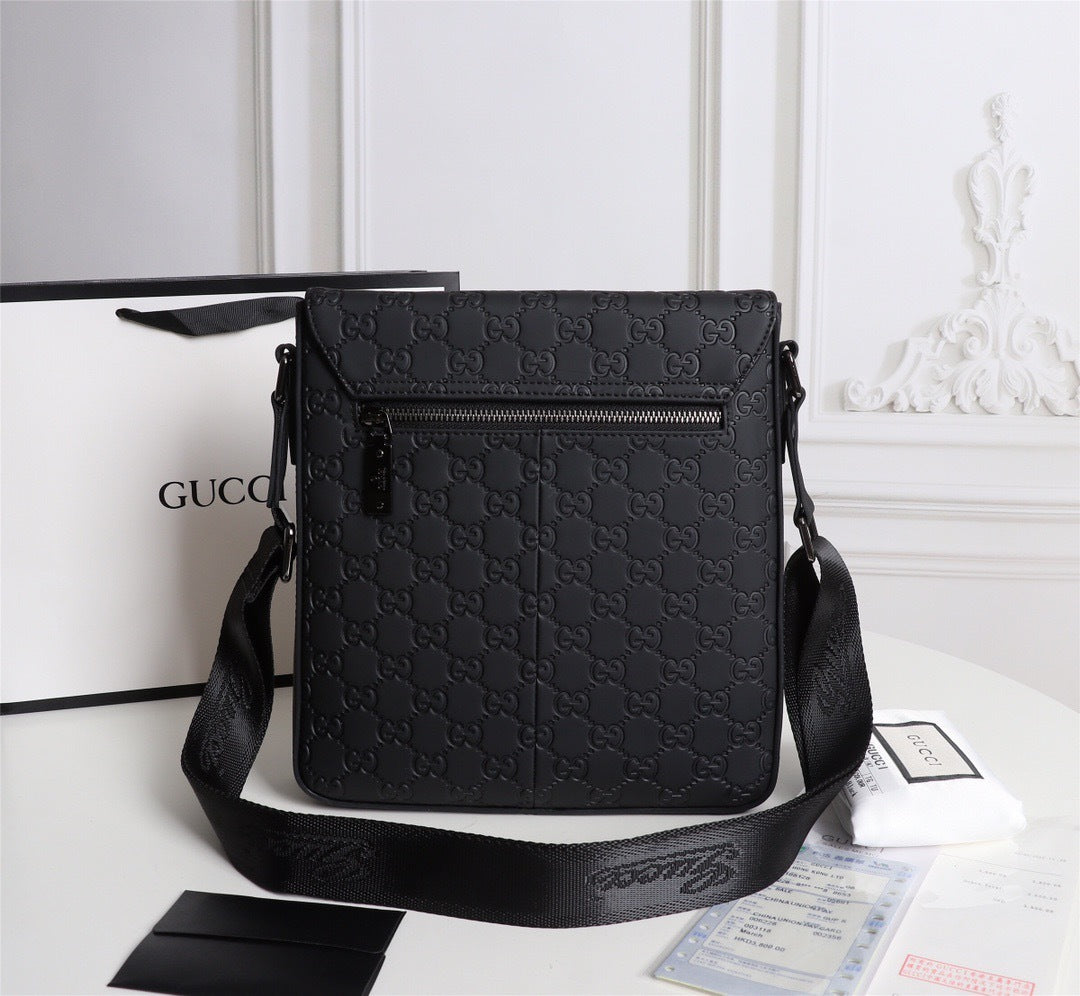 Gucci GG Embossed Messenger Bag